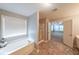 Bright bathroom featuring a tub, shower, and double sink vanity at 7979 Larksview Dr, Fairburn, GA 30213