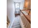 High ceiling entryway with stairs, a hanging light fixture and a view of the front door at 7979 Larksview Dr, Fairburn, GA 30213