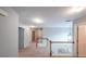 Hallway overlooking wooden railing at 7979 Larksview Dr, Fairburn, GA 30213
