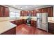 Well-equipped kitchen featuring stainless steel appliances, ample counter space, and abundant storage at 7979 Larksview Dr, Fairburn, GA 30213