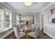 Elegant dining room with hardwood floors and views of kitchen at 949 Hope Sw Dr, Atlanta, GA 30310