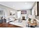 Cozy living room with fireplace, hardwood floors, and modern furnishings at 949 Hope Sw Dr, Atlanta, GA 30310