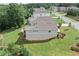 Aerial view of the backyard, deck, patio, and landscaped yard at 125 Registry Ln, Canton, GA 30115