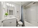 Bathroom featuring a shower/tub combo and a sink with a white vanity at 125 Registry Ln, Canton, GA 30115