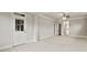 Spacious bedroom with an exterior access door and a ceiling fan at 125 Registry Ln, Canton, GA 30115