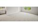 Bedroom featuring carpet, a window, and an en-suite bathroom at 125 Registry Ln, Canton, GA 30115