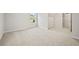 Neutral bedroom with soft carpeting, natural light, and a view of the outdoors at 125 Registry Ln, Canton, GA 30115