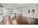 Open-concept kitchen featuring a large island, stainless steel appliances, and hardwood floors at 125 Registry Ln, Canton, GA 30115