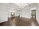 Living room features hardwood floors, coffered ceilings and an open entryway with stylish lamps at 125 Registry Ln, Canton, GA 30115