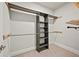 Walk-in closet featuring built-in shelving and hanging rods at 125 Registry Ln, Canton, GA 30115