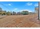 Large lot ready for landscaping, adjacent to street; part of a residential construction site at 19 Bridgemill Dr, Douglasville, GA 30134