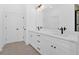 Bathroom with double sink vanity, quartz countertops, and a view from the window at 19 Bridgemill Dr, Douglasville, GA 30134