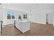 Modern kitchen island with granite countertops and stainless steel dishwasher at 19 Bridgemill Dr, Douglasville, GA 30134