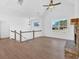 Open-concept living area boasts a stone fireplace and lots of natural light at 19 Bridgemill Dr, Douglasville, GA 30134