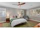 A bedroom with lots of natural light, hardwood floors, and a ceiling fan at 228 Mount Vernon Dr, Decatur, GA 30030