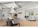 Open concept dining room with modern decor, stylish lighting, and hardwood floors at 228 Mount Vernon Dr, Decatur, GA 30030