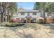 Inviting two-story home featuring a manicured front lawn and a charming, classic facade at 228 Mount Vernon Dr, Decatur, GA 30030