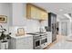 Gourmet kitchen features marble backsplash, stainless steel appliances, and ample cabinet space at 228 Mount Vernon Dr, Decatur, GA 30030