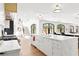 Elegant kitchen features a large island, stainless steel appliances and hardwood floors at 228 Mount Vernon Dr, Decatur, GA 30030