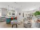 Open floor plan showcases a modern kitchen with breakfast bar seating and adjacent living room and dining area at 228 Mount Vernon Dr, Decatur, GA 30030