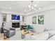 Cozy living room features a fireplace, art, and comfortable seating with natural light at 228 Mount Vernon Dr, Decatur, GA 30030