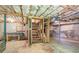 Unfinished basement with stairs, exposed insulation, and exposed pipes, ready to be customized and finished at 315 Renae, Marietta, GA 30060