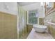 Bathroom featuring green wall tiles and a modern-style sink and vanity at 315 Renae, Marietta, GA 30060