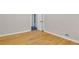 This bedroom features light-gray walls and gleaming hardwood flooring throughout at 315 Renae, Marietta, GA 30060