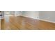 Bedroom featuring hardwood floors, light-colored walls, and a door leading outside at 315 Renae, Marietta, GA 30060