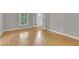 Bright bedroom featuring hardwood floors, light-colored walls, and a window with natural light at 315 Renae, Marietta, GA 30060