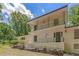 Lovely two-story home boasts an upstairs balcony overlooking the front yard and mature shade trees at 315 Renae, Marietta, GA 30060