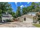 A two-car detached garage is connected to the main house by a portico, offering covered parking at 315 Renae, Marietta, GA 30060