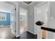 Hallway with dark hardwood floors and open doorways at 315 Renae, Marietta, GA 30060
