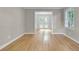 Bright living room with hardwood floors, neutral walls, and a window providing natural light at 315 Renae, Marietta, GA 30060