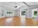 Bright Living Room with hardwood floors, built-in shelving and natural light from large windows at 315 Renae, Marietta, GA 30060