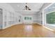 Spacious Living Room featuring hardwood floors, built-in shelving, and natural light at 315 Renae, Marietta, GA 30060