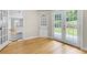 Cozy sitting room with hardwood floors, built-in cabinets, and patio access at 315 Renae, Marietta, GA 30060