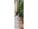 The home's inviting side porch has a concrete floor and overlooks the surrounding lush greenery at 315 Renae, Marietta, GA 30060