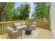 Inviting back deck with wicker furniture and outdoor seating area, perfect for relaxing at 4103 Brenda Dr, Decatur, GA 30035