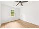 Bedroom with wood-look floors, white walls, and a ceiling fan at 4103 Brenda Dr, Decatur, GA 30035