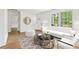 Bright living room featuring modern furniture, large windows, and hardwood floors at 4103 Brenda Dr, Decatur, GA 30035
