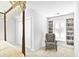 Bright and cozy bedroom featuring a comfortable reading nook with a built-in bookshelf at 4314 Woodhaven Se Way, Smyrna, GA 30082