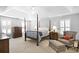 Bedroom featuring a four-poster bed, and a comfortable chair at 4314 Woodhaven Se Way, Smyrna, GA 30082