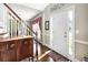 Inviting foyer with hardwood floors, staircase, and elegant decor, creating a warm first impression at 4314 Woodhaven Se Way, Smyrna, GA 30082