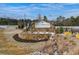 Stone sign welcomes visitors to Wildwood Place, complemented by manicured landscaping at 4511 Twinberry Dr, Powder Springs, GA 30127