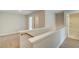 Upstairs hallway with luxury vinyl plank flooring and modern design at 4511 Twinberry Dr, Powder Springs, GA 30127