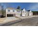 Street view of modern townhomes with brick accents, garages, and contemporary design at 4511 Twinberry Dr, Powder Springs, GA 30127