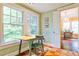 Cozy breakfast nook with terracotta tile, natural light, and adjacent to the dining room at 50 Rumson Ne Way, Atlanta, GA 30305