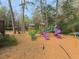 Community playground with colorful slides, climbers, and swings for recreation and enjoyment at 50 Rumson Ne Way, Atlanta, GA 30305