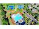 Aerial view of community pool, tennis courts, and parking area at 2922 Heart Pine Way, Buford, GA 30519